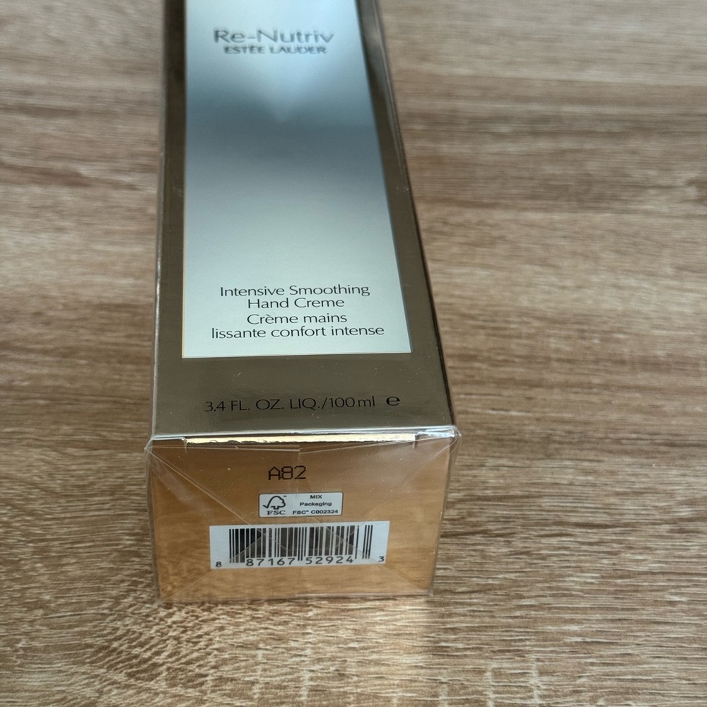 Estee Lauder Luxurious Hand Cream Packaging in Silver and Gold
